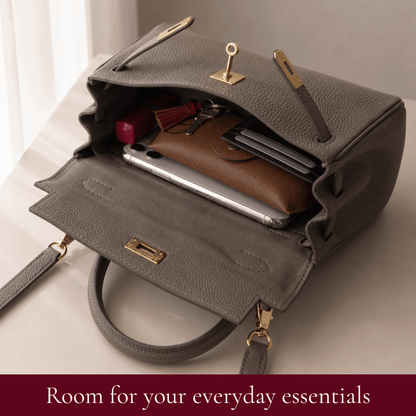 Interior of the Grace DIY leather satchel holding everyday essentials